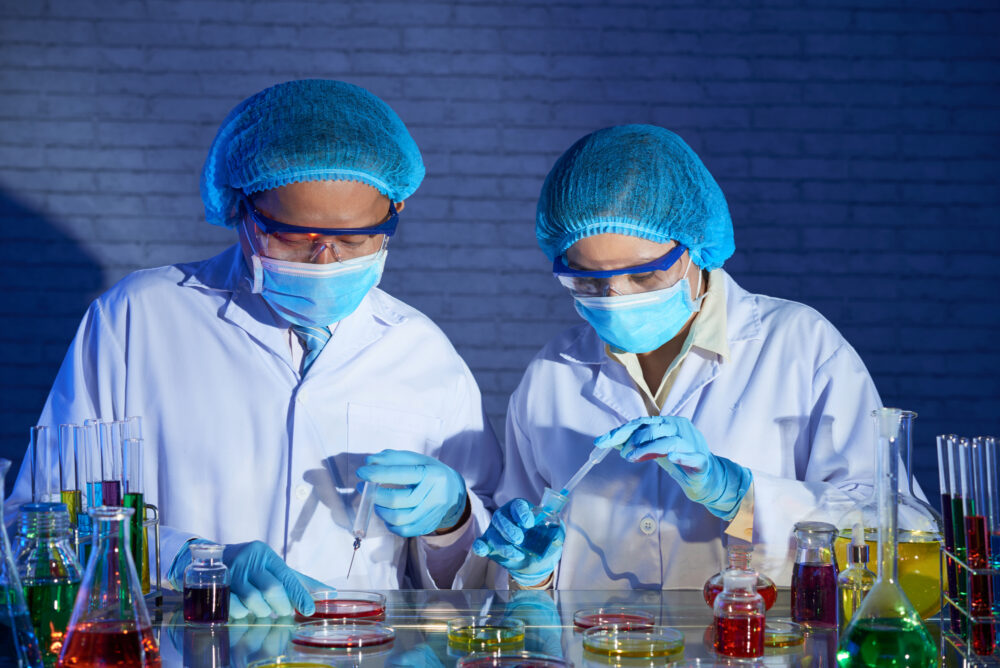 Scientists conducting a lab experiment.